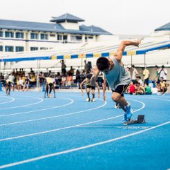 Sprinters leaving their starting blocks