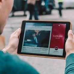 Software application for a publishing business displayed on a tablet