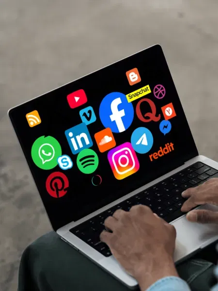 laptop with social media icons